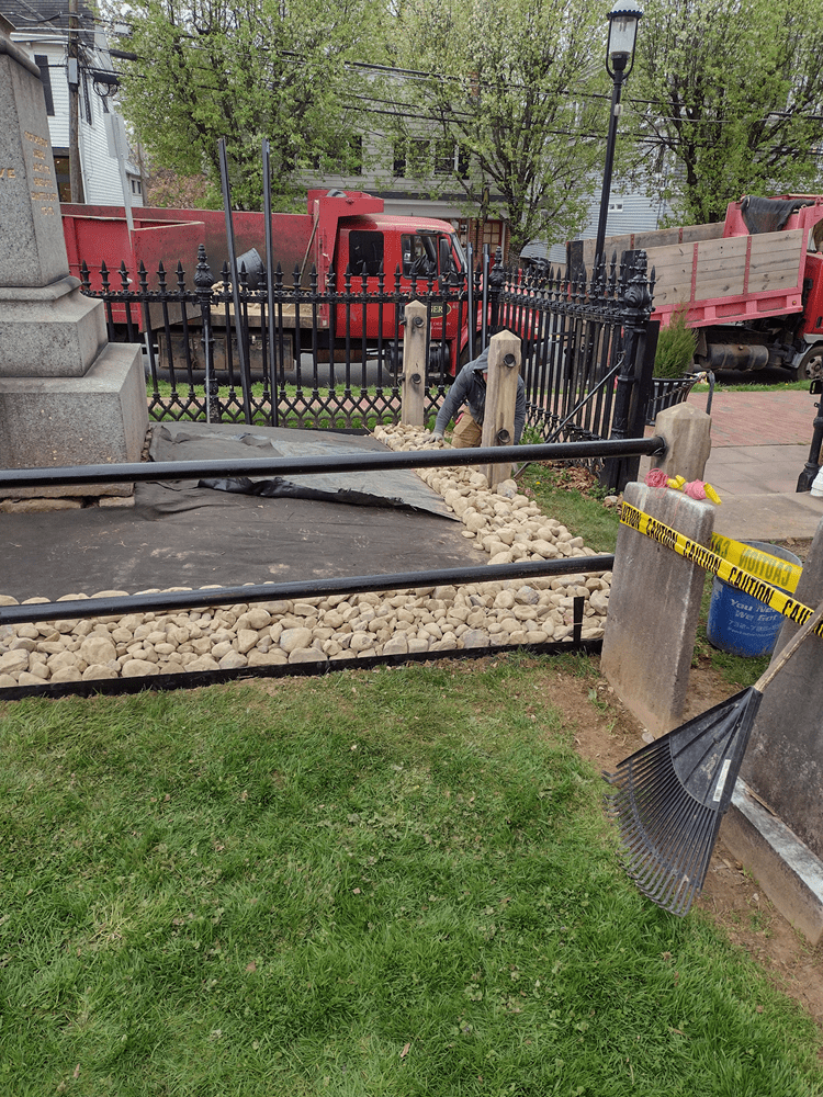 Large rocks fill in the perimeter surrounding the monument.