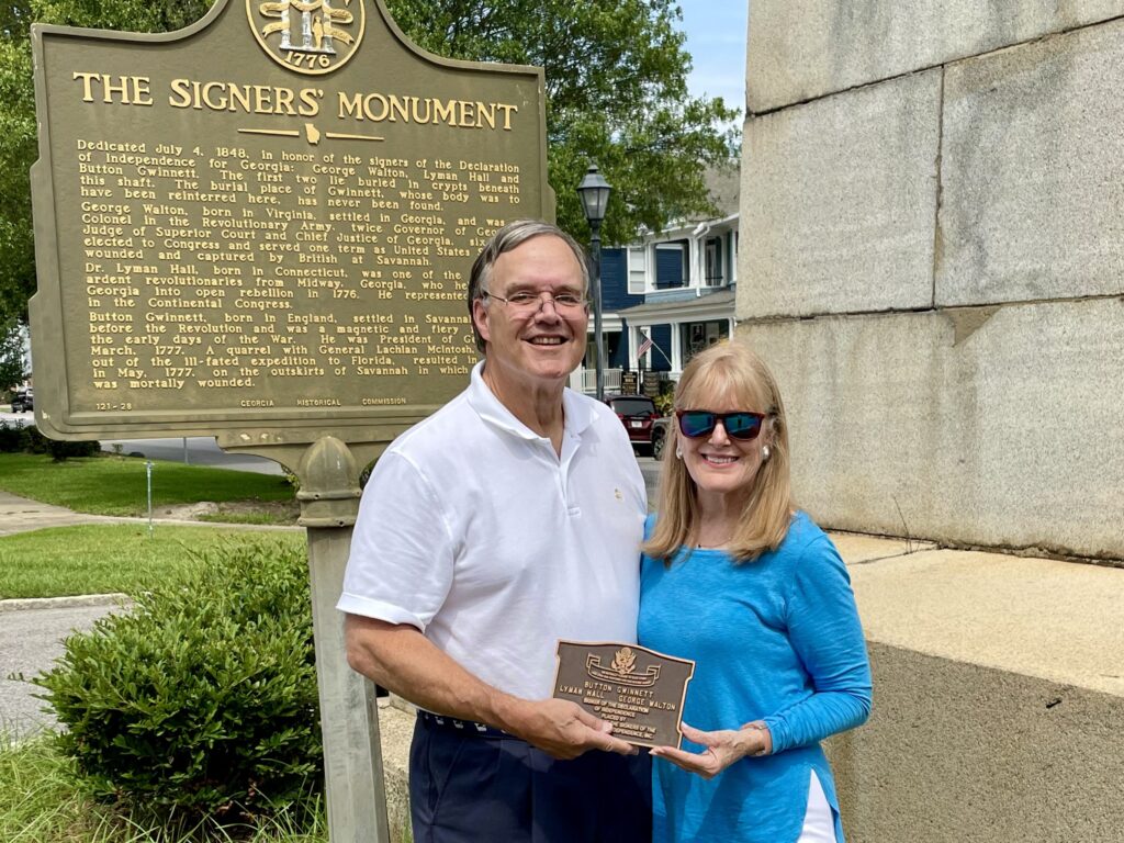Weston and Ouida Croft return Button Gwinnett’s plaque to the Signers’ Monument in Georgia.