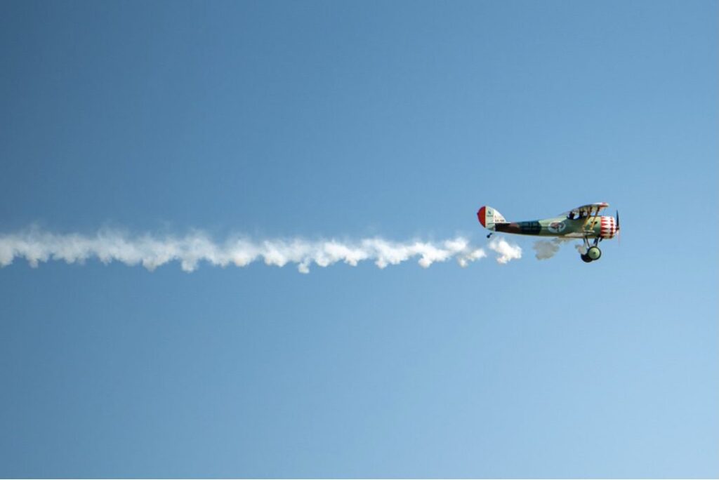 Local pilot Paul Suace flies a Nieuport 28 during the reinterment ceremony for Captain Hamilton Coolidge.
